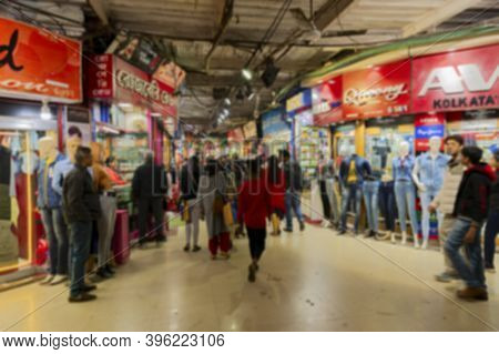 Blurred Image Of People Walking Inside New Market At Esplanade Area In The Evening. It Is One Of The
