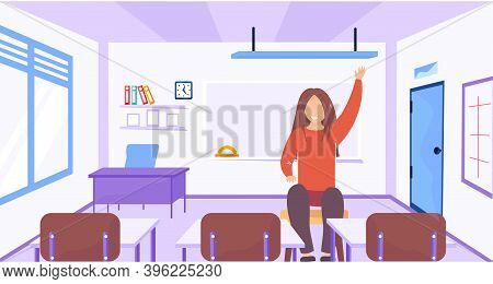 A Young Girl Raises Her Hand Up Sitting In Empty Classroom. The Student Is Ready For Entrance Exams.