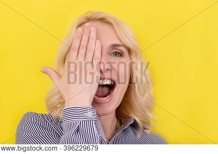 The Beautiful Blonde Closed Her Eyes With Her Hand, Laughs