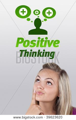 Ung pige hoved ser med gestus på positive negative tegn