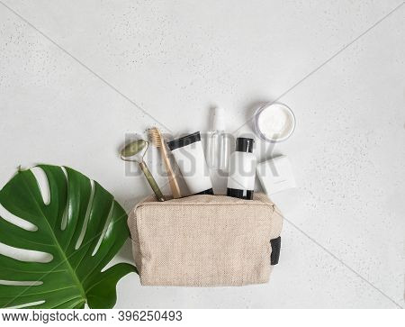Travel Cosmetic Bag With The Necessary Means To Care For Women's Skin. Cosmetics, Massager With Crys