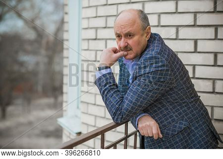 Senior Man In Grief And Sorrow. The Concept Of A Depressed Older Man, The Non-acceptance Of Oneself 