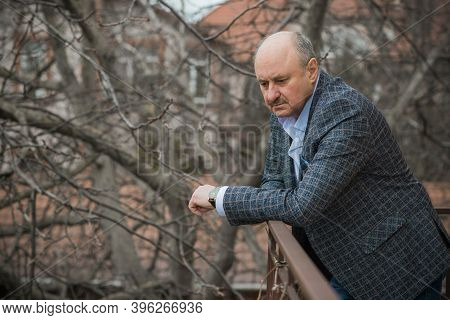 Senior Man In Grief And Sorrow. The Concept Of A Depressed Older Man, The Non-acceptance Of Oneself 