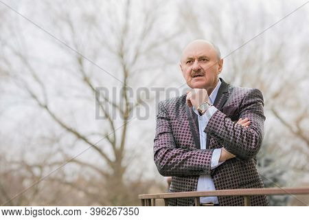 Senior Man In Grief And Sorrow. The Concept Of A Depressed Older Man, The Non-acceptance Of Oneself 