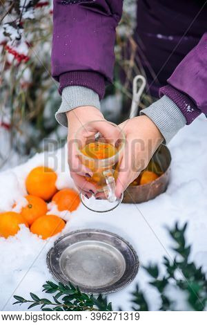 Mulled Wine With Sea Buckthorn And Mandrins In The Winter Garden Selective Focus