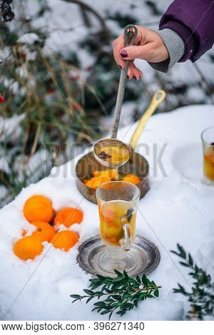 Mulled Wine With Sea Buckthorn And Mandrins In The Winter Garden Selective Focus