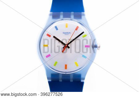 Rome, Italy 07.10.2020 - Swatch Childrens Cheapest Trendy Swiss Made Quartz Watch Close Up. Blue Pla
