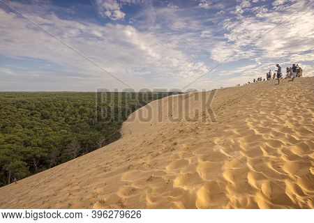 La Teste-de-buch, France - August 12, 2017: Tourists On The Top Of The Dune Of Pilat, The Tallest Sa