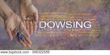 Words Associated With Dowsing - Female Hand Showing A Selection Of Dowsing Pendulums Beside A Dowsin