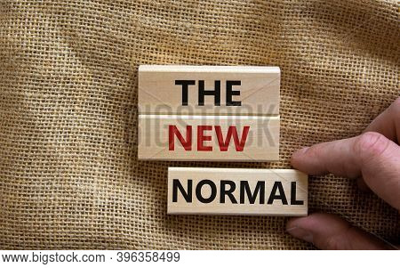 The New Normal Concept. Wooden Blocks With Words 'the New Normal'. Beautiful Canvas Background, Male