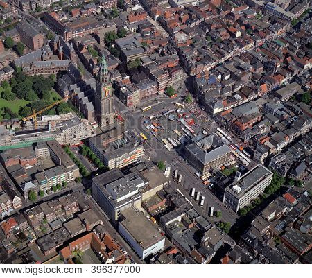 Groningen, Holland, July 12 - 1990: Historical aerial photo of Groningen with in the center the Martinitoren at the grote Markt, Holland