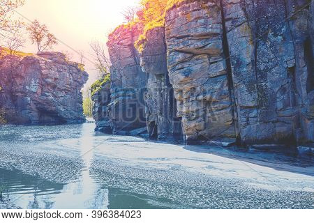 View To A Mountain River In Early Spring. Rocky Riverbanks