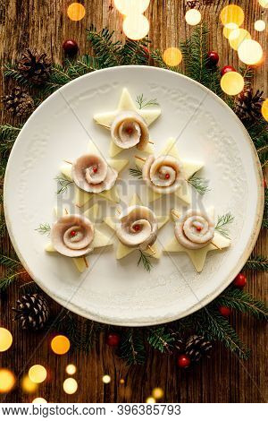 Herring Fillets On A Plate, Top View. Traditional Christmas Eve Dish