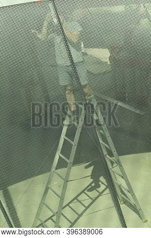 Glazier Installing And Repairing Glass