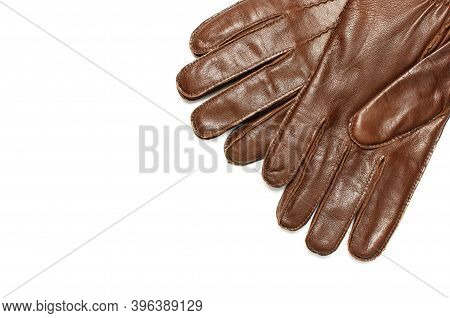 Brown Classic Leather Mens Gloves On White Isolated Background Top View. Stylish Fashionable Winter 