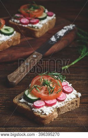 Vegetarian Sandwiches With Fresh Sliced Tomatoes, Cucumber And Radish