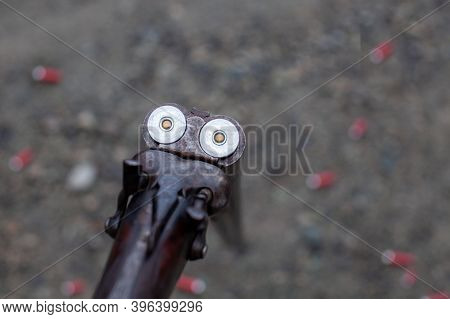 An Old, Vintage, Break-action Double-barrel Shotgun Featuring Two Triggers And Two Hammers. Action I