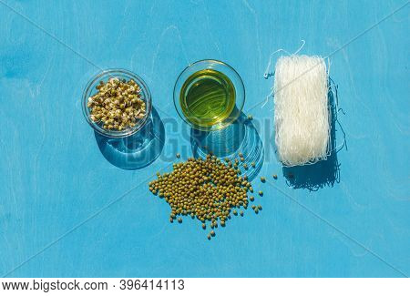 The Munga Beans, Sprouts For Salad And Glass Noodle Cellophane, The Layout On A Blue Background, Wit