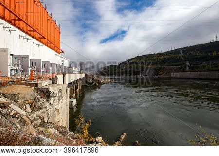 The Main Building Of The Kolyma Hydroelectric Power Station On The Kolyma River.