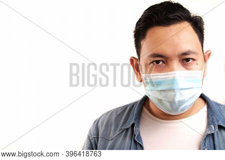 Man Wearing Protective Facial Mask. Nwe Normal Concept. Close Up Head Shot Portrait Isolated On Whit