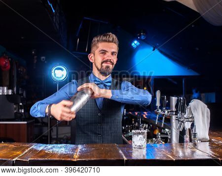 Bartender Concocts A Cocktail On The Beerhall