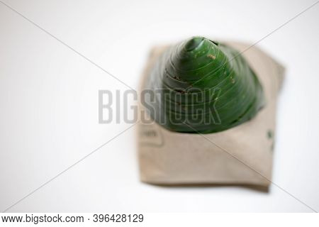 Shallow Depth Of Field Focus On Nasi Lemak Bungkus (packed Fragrance Rice) National Breakfast Dish O