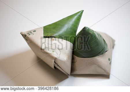 Shallow Depth Of Field Focus On Nasi Lemak Bungkus (packed Fragrance Rice) National Breakfast Dish O