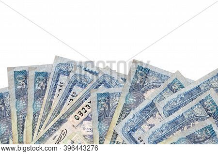 50 Nepalese Rupees Bills Lies On Bottom Side Of Screen Isolated On White Background With Copy Space.