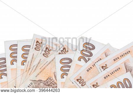 200 Czech Korun Bills Lies On Bottom Side Of Screen Isolated On White Background With Copy Space. Ba