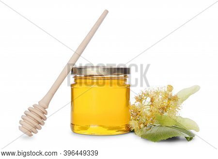 Jar Of Linden Honey, Honey Dipper And Lime Flowers Isolated On White Background.