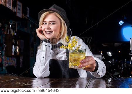 Charming Woman Barman Creates A Cocktail On The Bar