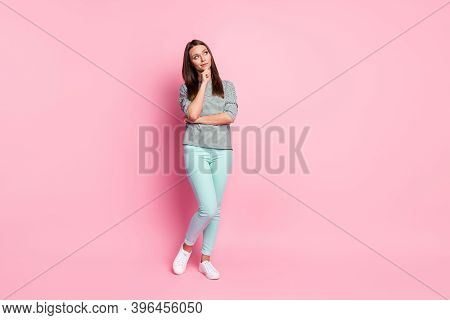 Full Size Photo Of Thinkable Sweet Girl Stand Look Empty Space Wear Blue Pants Sneakers Shirt Isolat