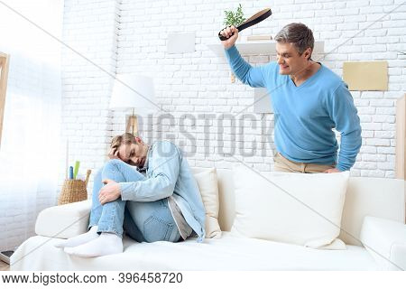 Father Swings His Belt To Hit His Son. Troubled Teenager Isn't Trying To Defend Himself.
