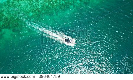 Turquoise Clear Water. Yachts, Boats Floating. Water Gradient From Light To Dark Blue. Phi Phi Don I