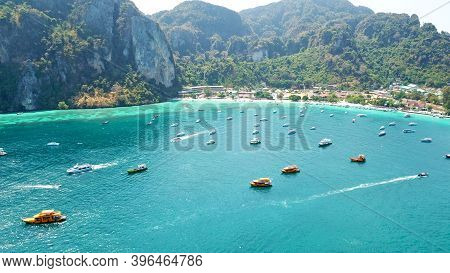 Turquoise Clear Water. Yachts, Boats Floating. Water Gradient From Light To Dark Blue. Phi Phi Don I