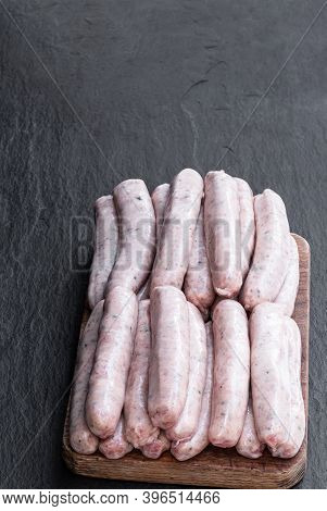 Pork  Sausages Chipolatas Isolated On White Background
