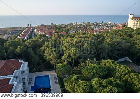 Aerial View Of A Beautiful Hotel On The Sea. Top View Of Seaside Resort. Amazing Landscape Of Turkis