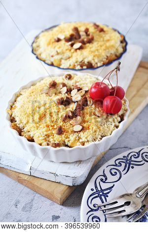 Apple Crumble With Almonds, Two Portions On Light Gray Background, Red Paradise Apples Dressing
