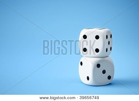 Two White Dices On Blue Background