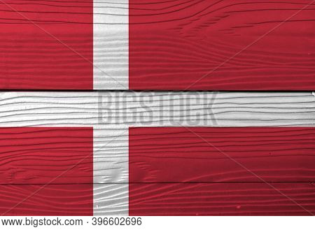 Flag Of Denmark On Wooden Wall Background. Grunge Denmark Flag Texture, Red With A White Scandinavia