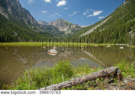 Sunny Slough Lake In Beartooth Mountains, Montana