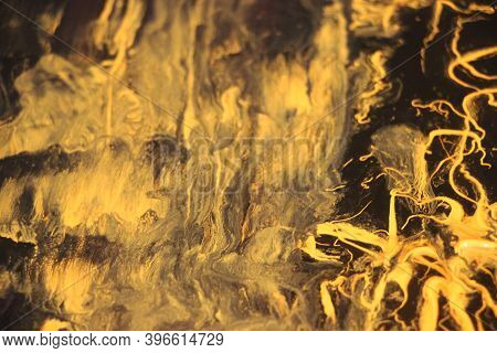 Black And Yellow Pigments Difusion Into Each Other Abstract Colorful Vivid Background