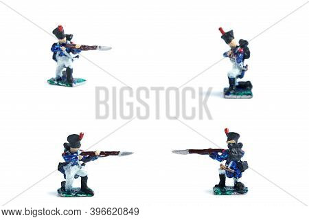 4 In 1 Photo Of Handmade Metal Soldiers With Musket On The White Background