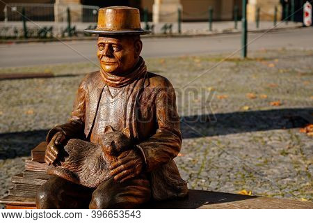 Wooden Sculpture Of Czech Writer Bohumil Hrabal, Bohumil Hrabal Sitting In The Bench With A Cat, Pre