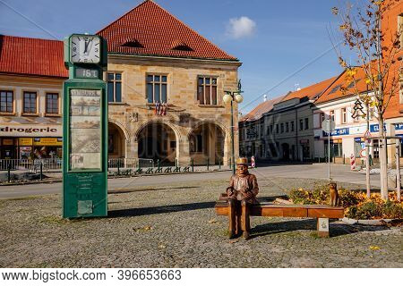 Wooden Sculpture Of Czech Writer Bohumil Hrabal, Bench With A Cat, Premyslid Square And Hlav's House