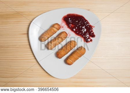 Latin-american Appetizers Called Tequenos Made Of Fried Corn Filled With Cheese