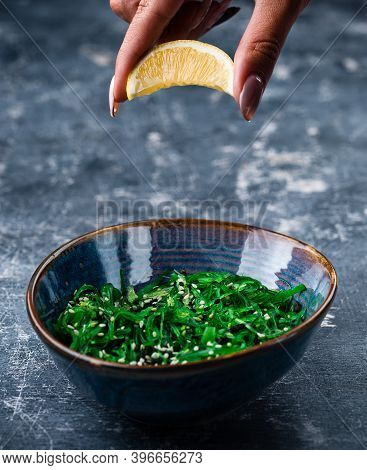 Chuka Laminaria Seaweed Salad With Lime On Plate. Traditional Japanese, Chinese, Korean Asian Seafoo