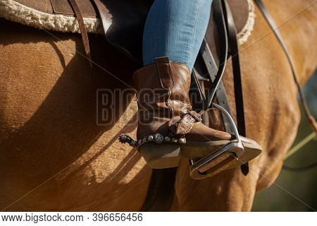 Cowboy Boot In Stirrup. Horseback Riding. Wild West. Horse.