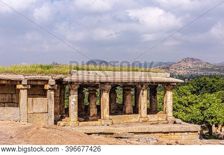 Hampi, Karnataka, India - November 4, 2013: Virupaksha Temple Complex. Moola Brown Stone Gallery Rui