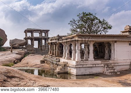 Hampi, Karnataka, India - November 4, 2013: Virupaksha Temple Complex. Ruined Moola White Pillar Sec